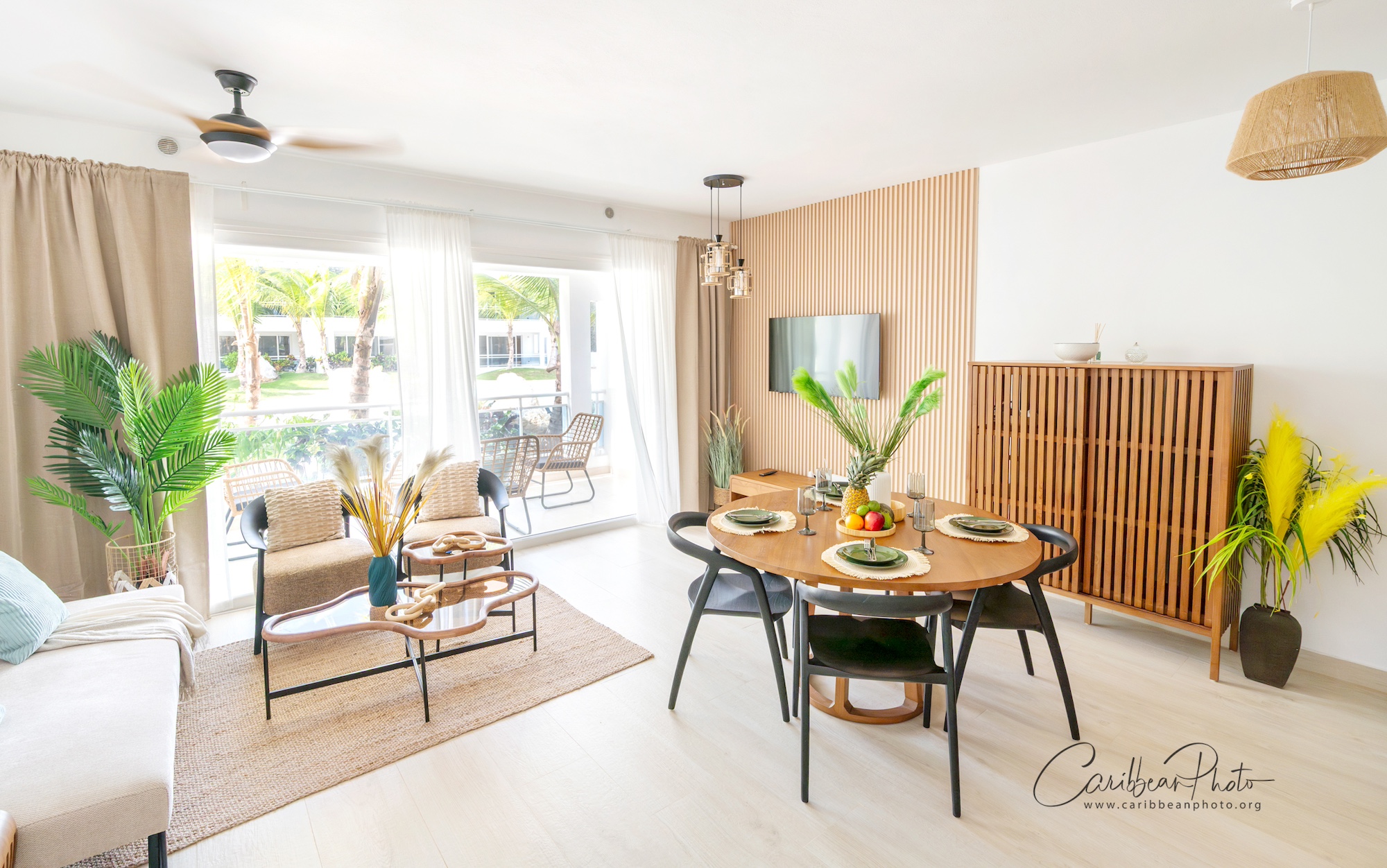 Estrella Garden One Bedroom in Dominicus - woven mirror and artwork - Home Now Design